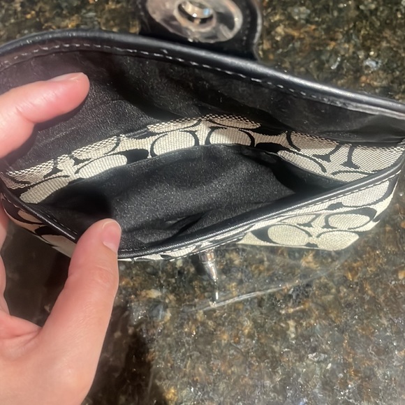 Coach Wristlet approximately 7.5 inches long by 5 inches wide. Good condition. - Picture 4 of 6